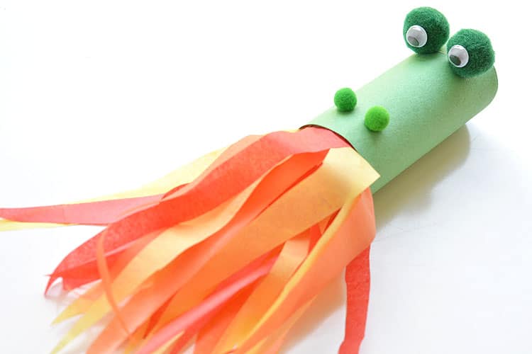 Green dragon head shotting orange and yellow flames